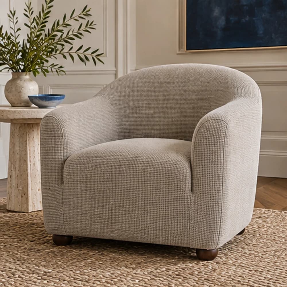 la housse texturée sur un fauteuil club dans un intérieur contemporain
